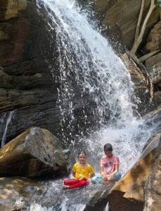 Enjoying in waterfall at Ajodhya Pahar